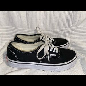 Black Vans lace up shoes